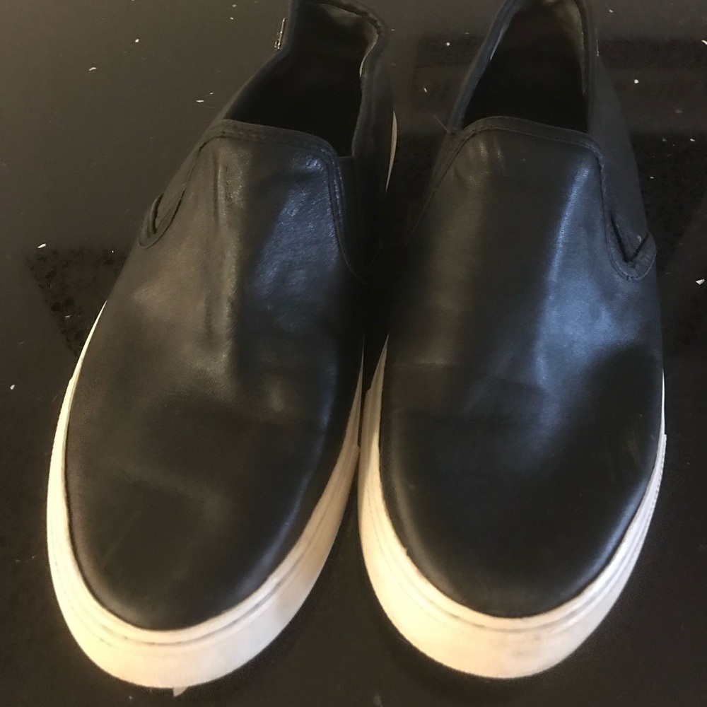 Tory Burch black slip ons